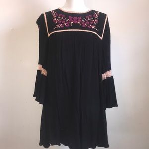 Fun wavy dress with flower designs.